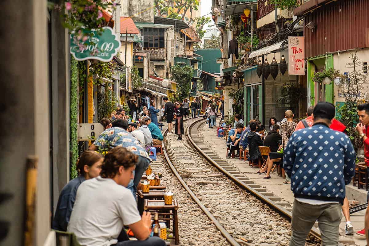 cafes set up alongside train street in hanoi