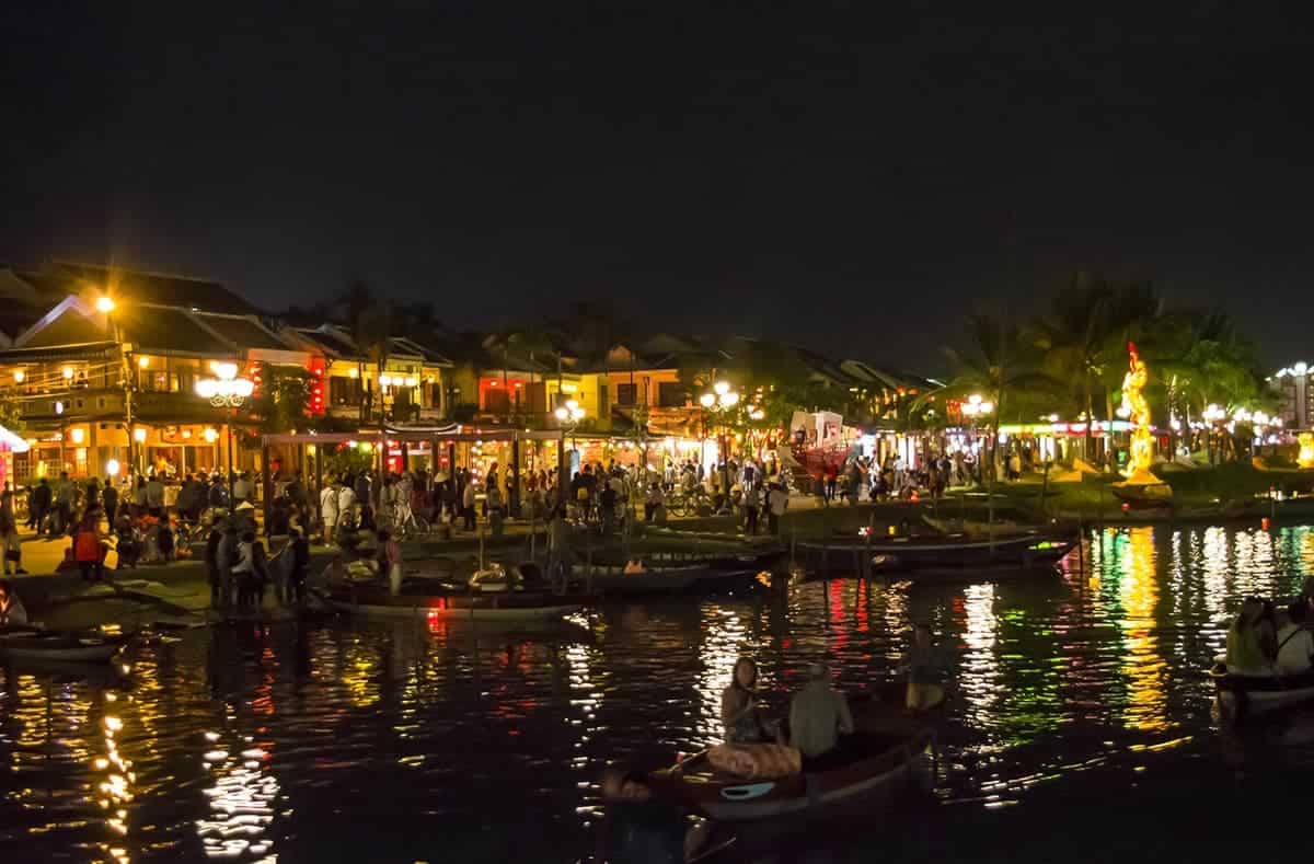 boats on the river under nightfall while spending 3 days in hoi an itinerary