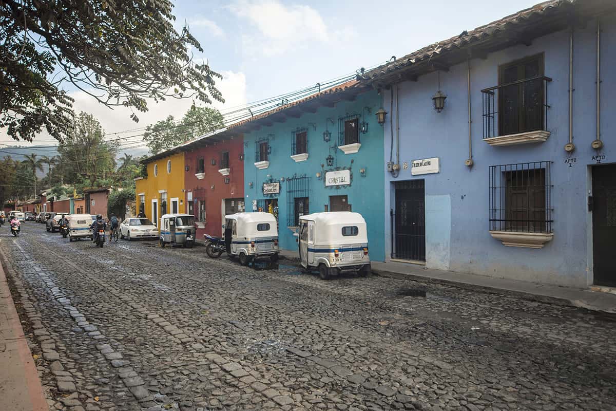 tuktuks lined up along the streets in antigua guatemala