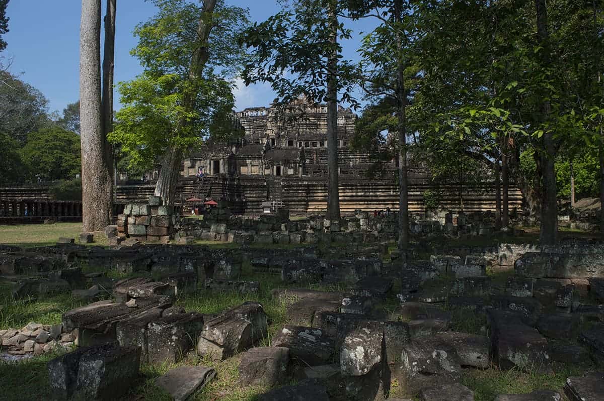 enjoying the shade underneath the trees at baphuon