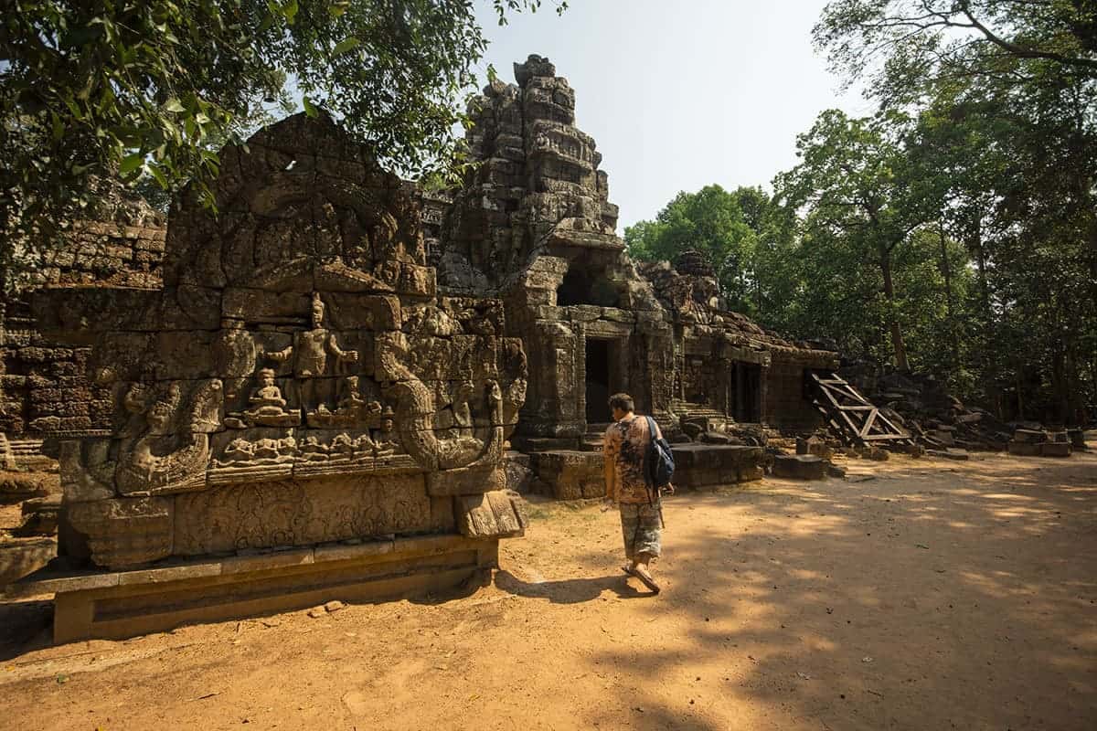 exploring on of the temples in the angkor archeological complex