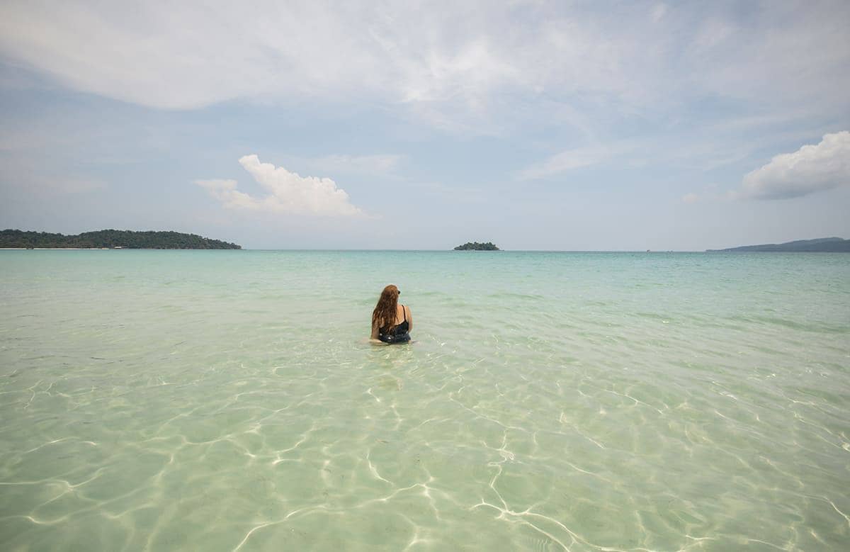 going for a swim on long set beach in koh rong