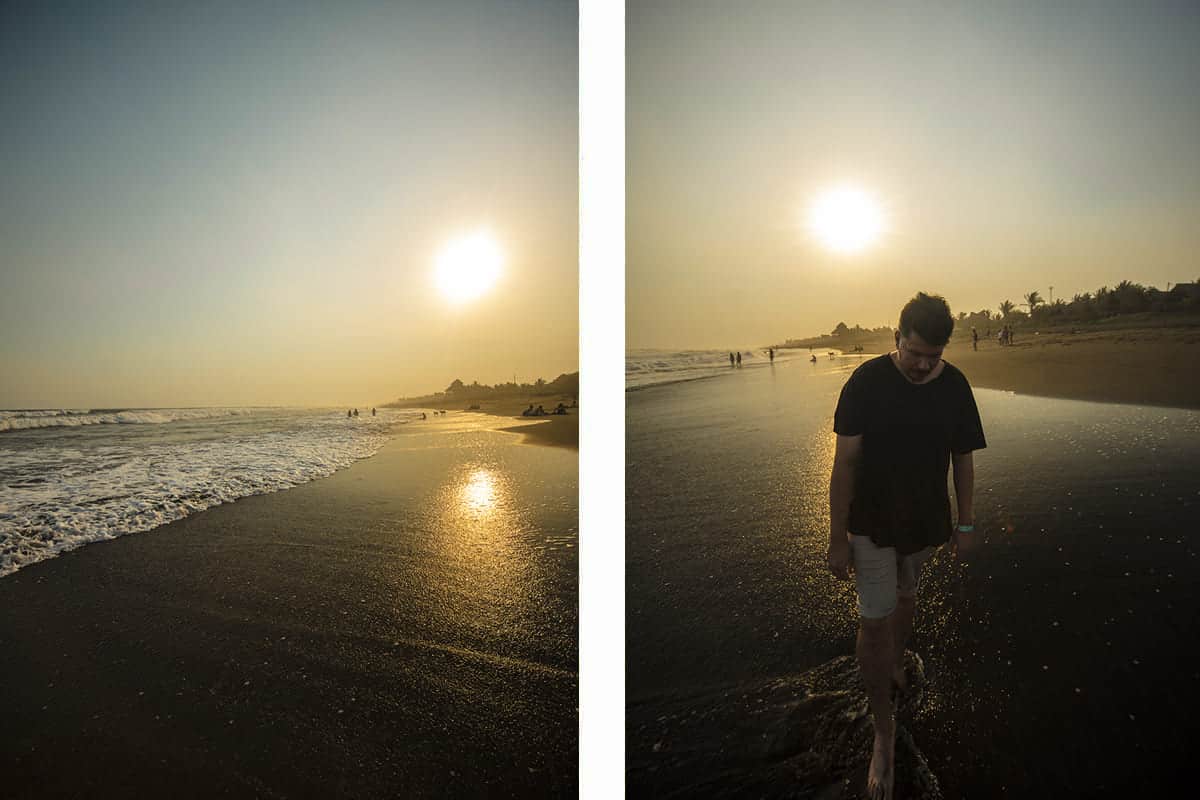 walking down the beach at el paredon in guatemala during sunset