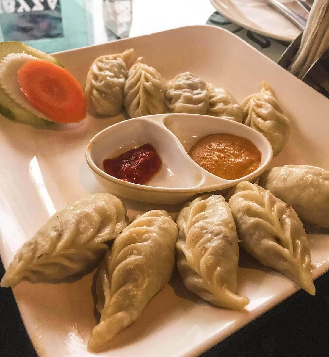thamel momo hut steamed momos with side salad in kathmandu