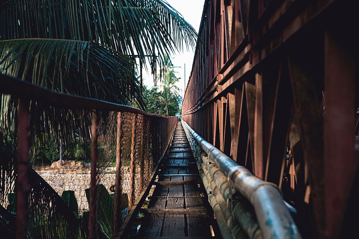 typical bridge over the mekong river while backpacking luang prabang
