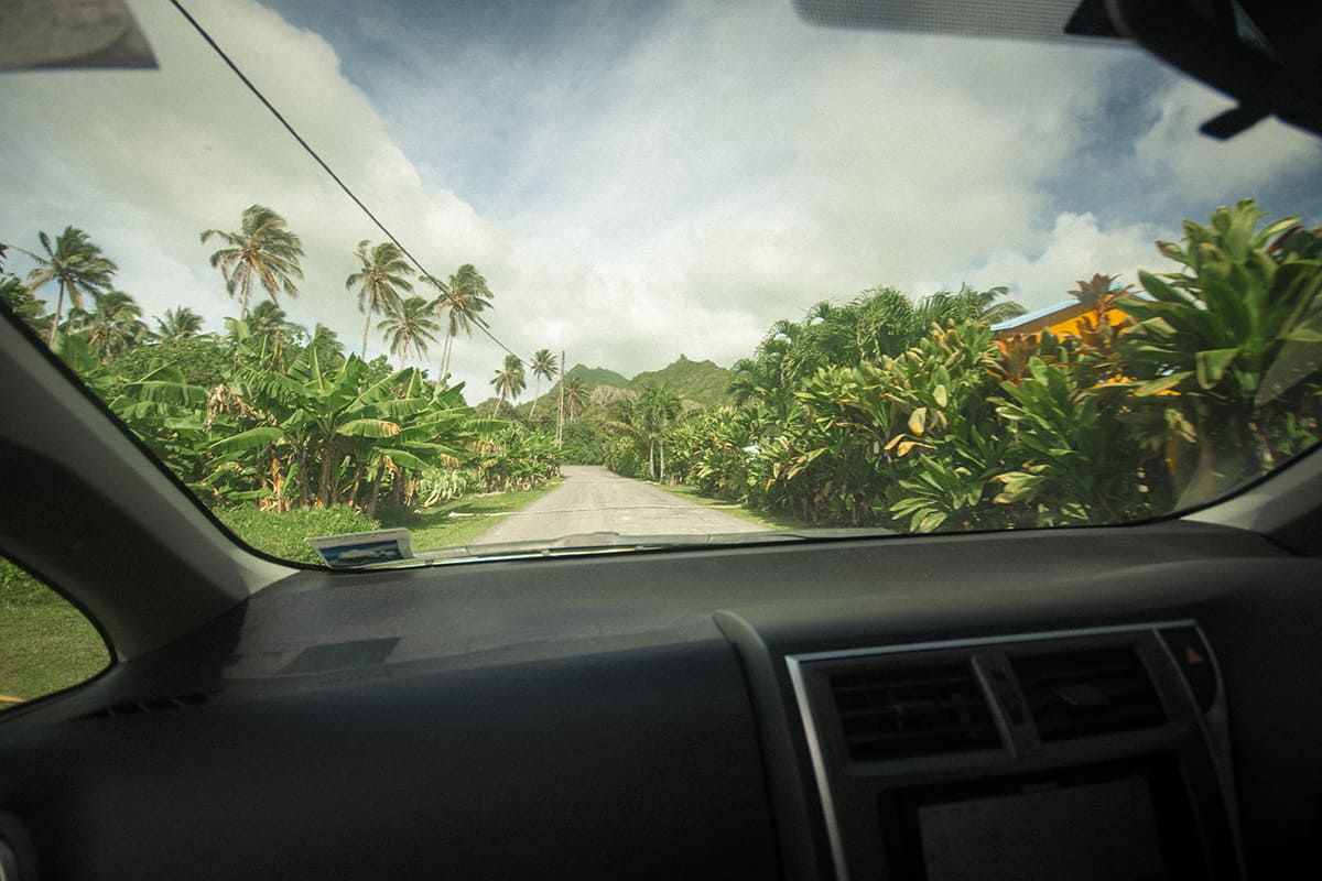 Backpacking Rarotonga On A Budget: Top Travel Tips 20 driving through one of the interior roads on rarotonga