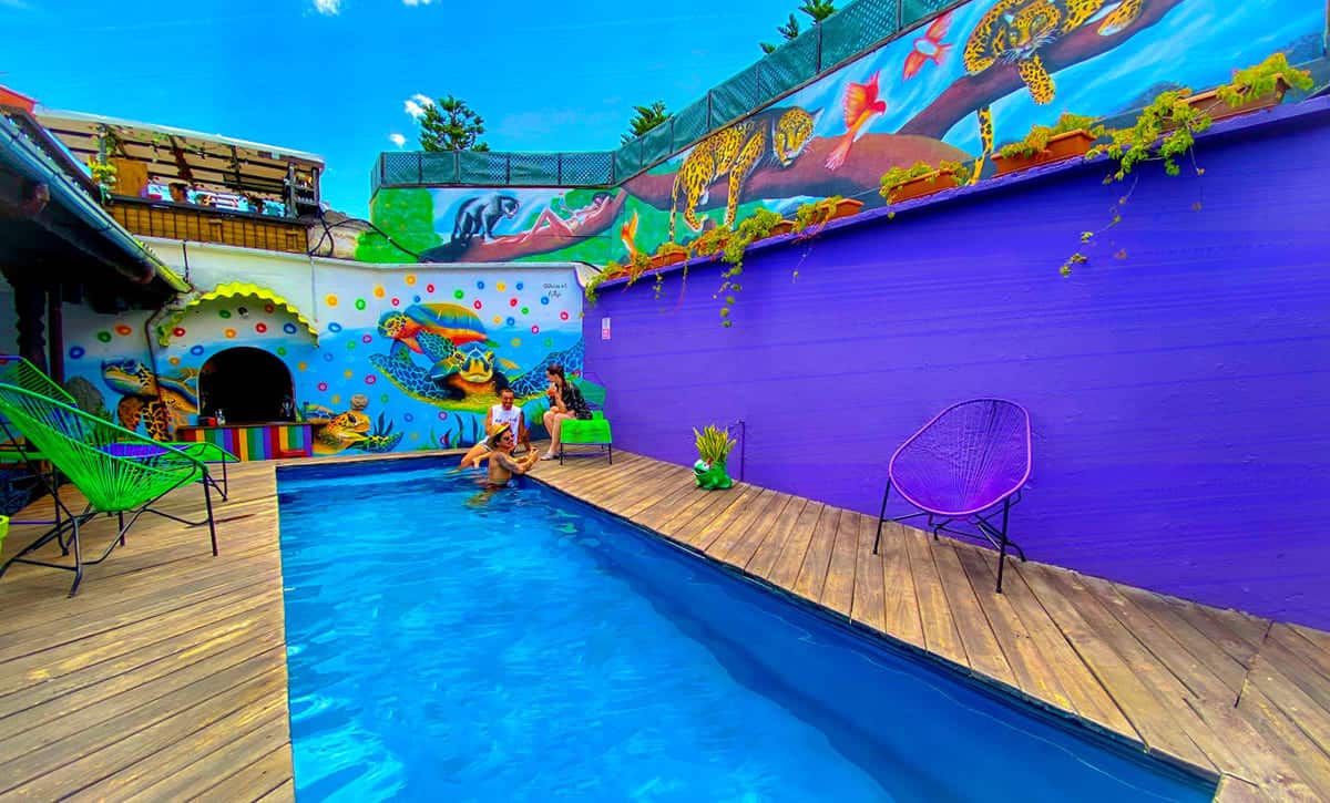 Best Hostels In Antigua, Guatemala: Best Stays In 2025 34 enjoying the communal space around the pool at tropicana hostel, and they also have a jacuzzi!