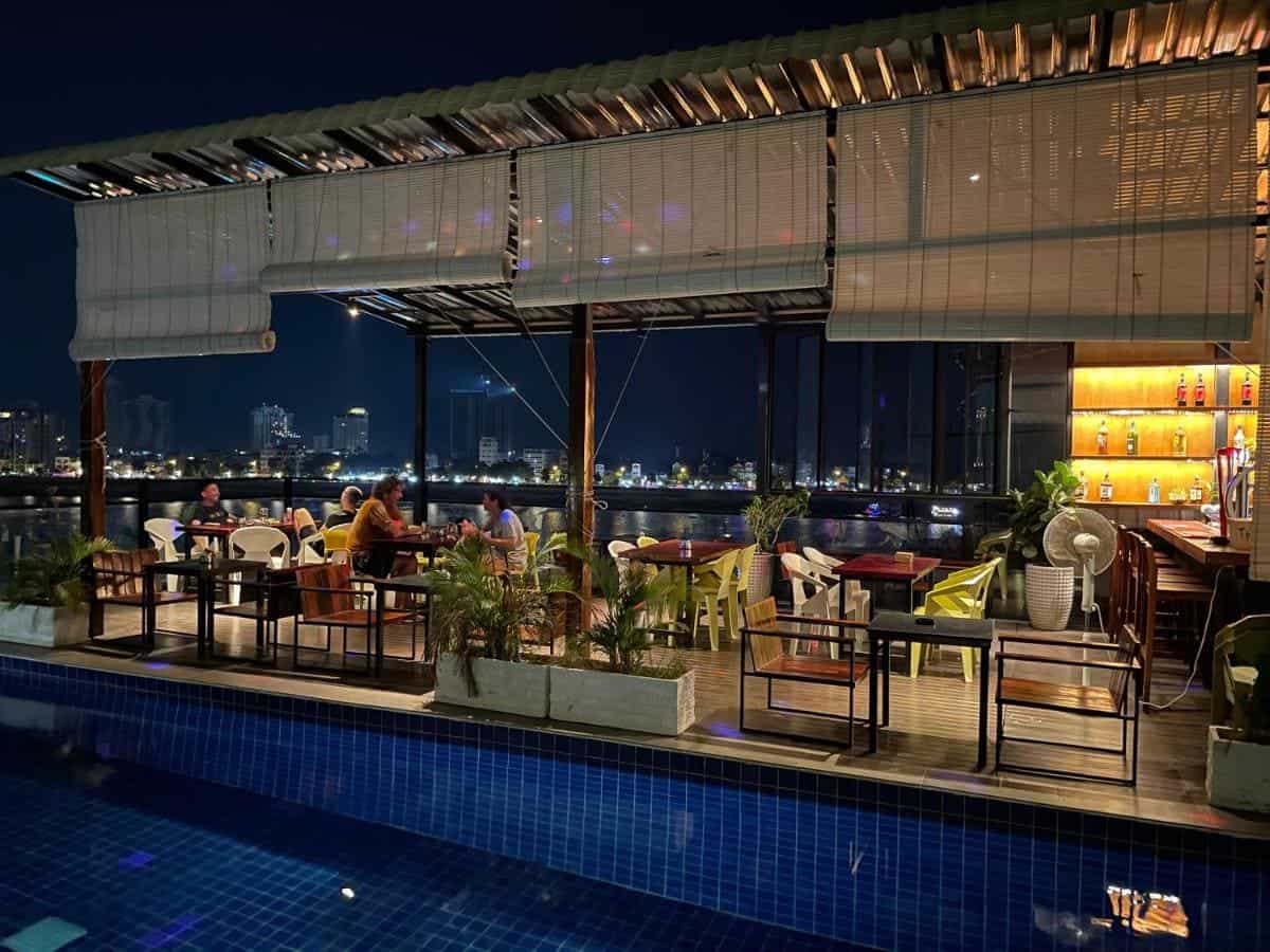 Best Hostels in Phnom Penh: 6 Hostels Worth Staying At In Phnom Penh 10 the impressive rooftop pool at night at onederz hostel phnom penh