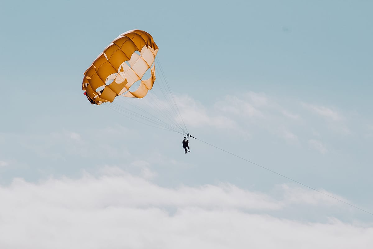 parasailing over the bays in roatan