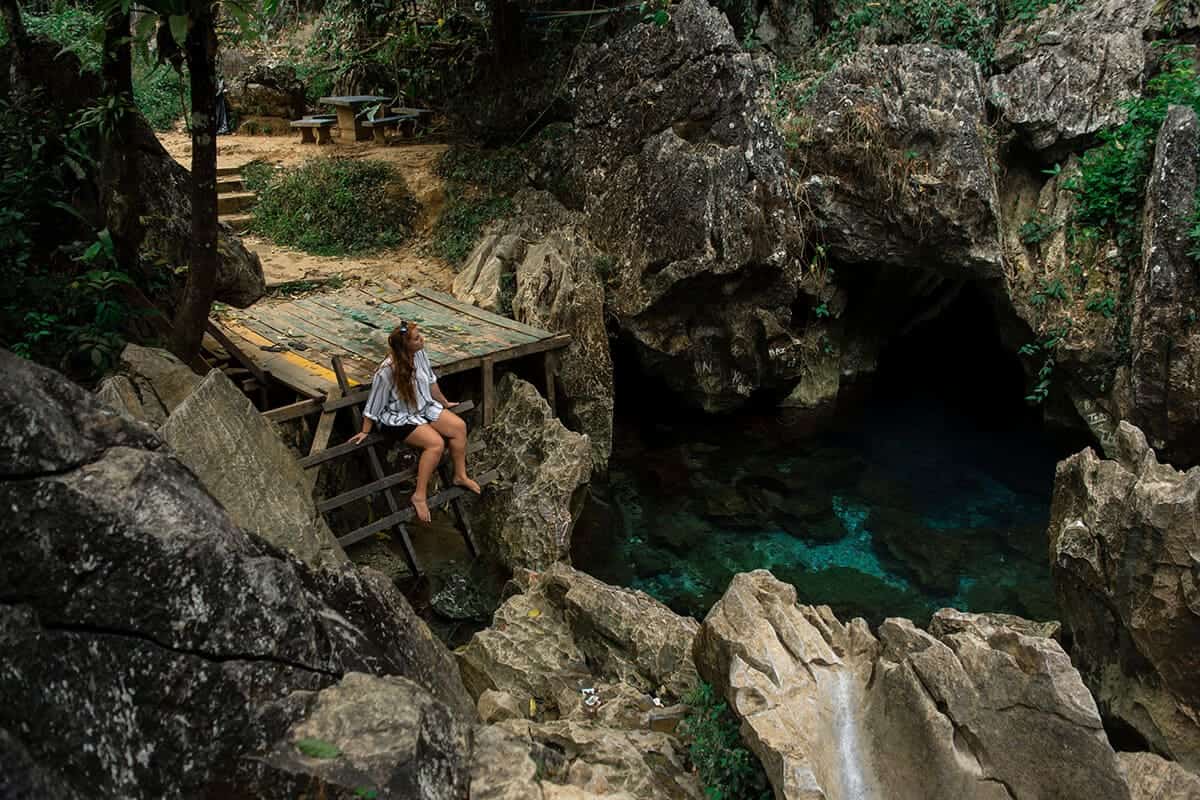 tasha amy sitting at blue lagoon two in vang vieng