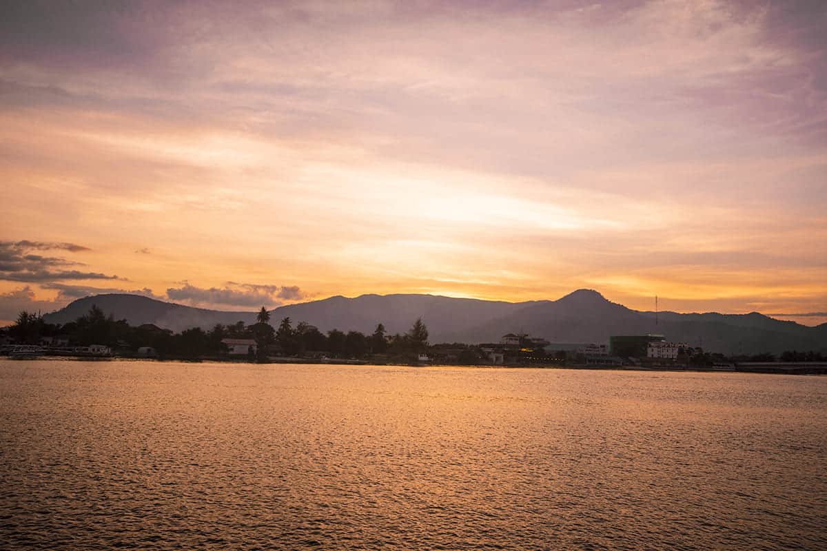 2 Weeks In Cambodia Itinerary: Ultimate Guide 2025 26 watching sunset over the kampot river in cambodia