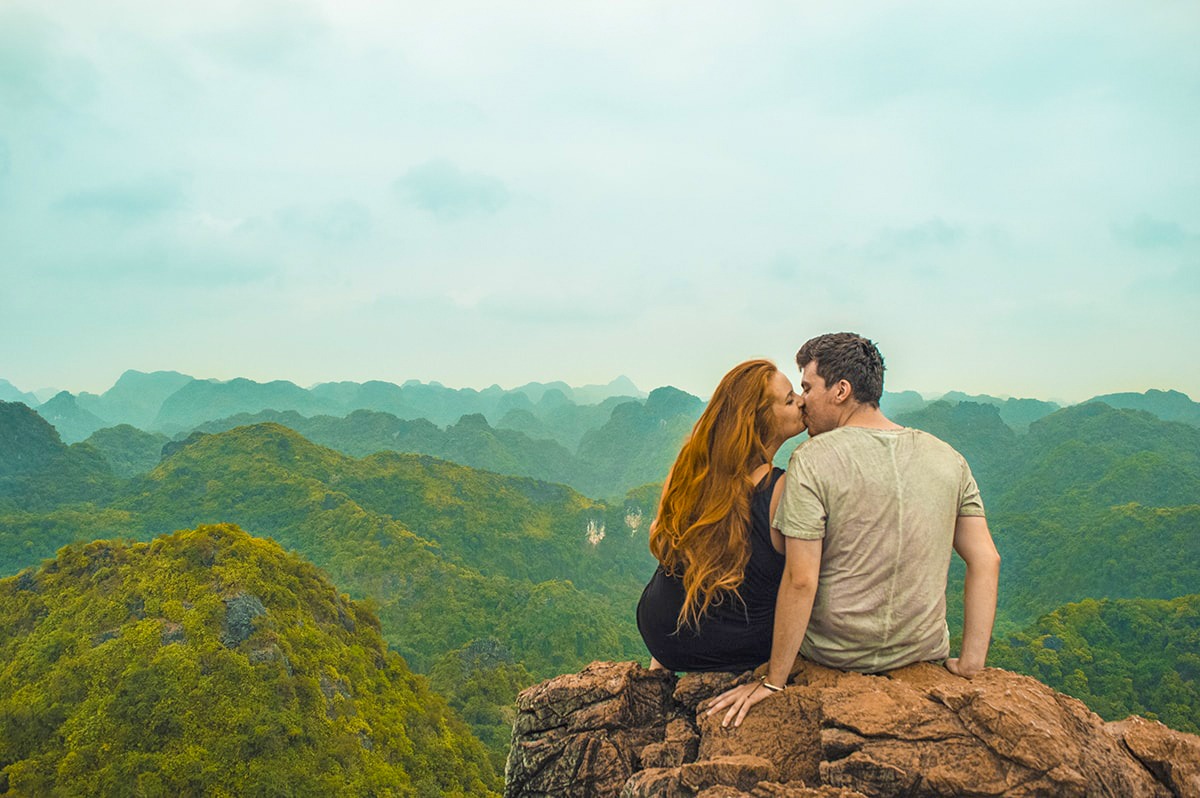 couple with view at cat ba national park vietnam