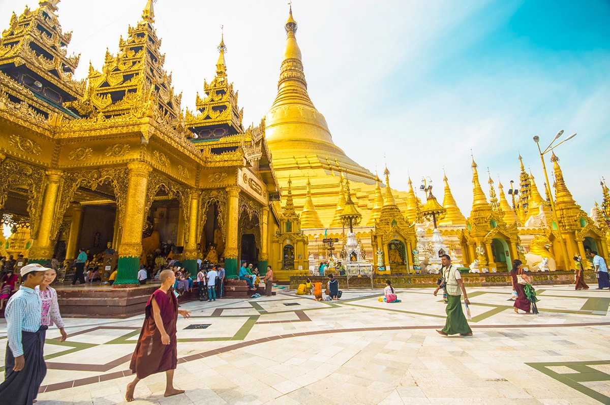 Visiting Shwedagon Pagoda: All You Need to Know 9 crowds walking around shwedagon pagoda