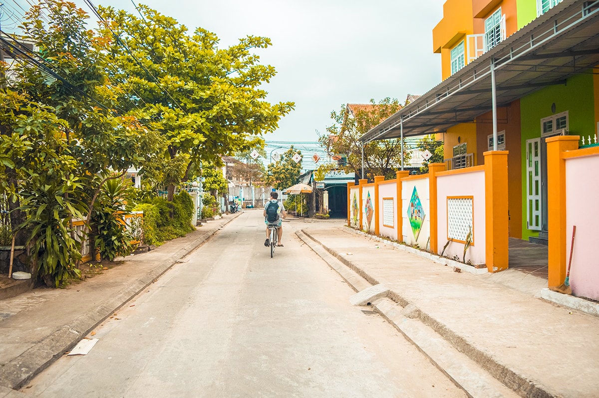 cycling through the streets of hoi an in vietnam