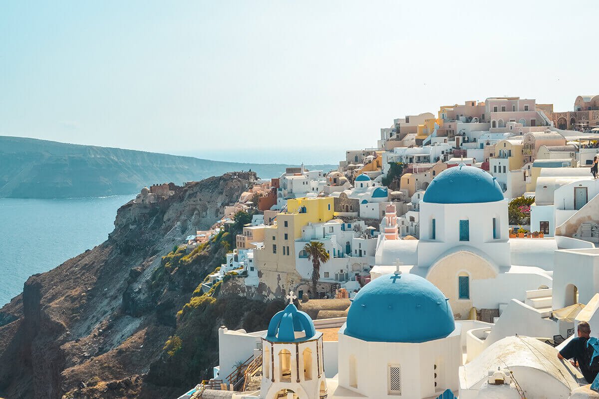 blue domed churches in oia sightseeing santorini