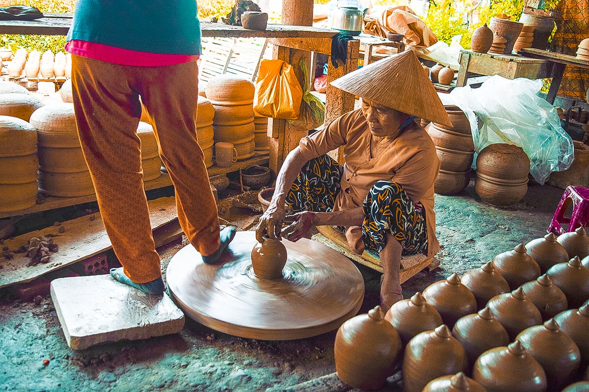 spinning pots at thanh ha pottery village hoi an vietnam