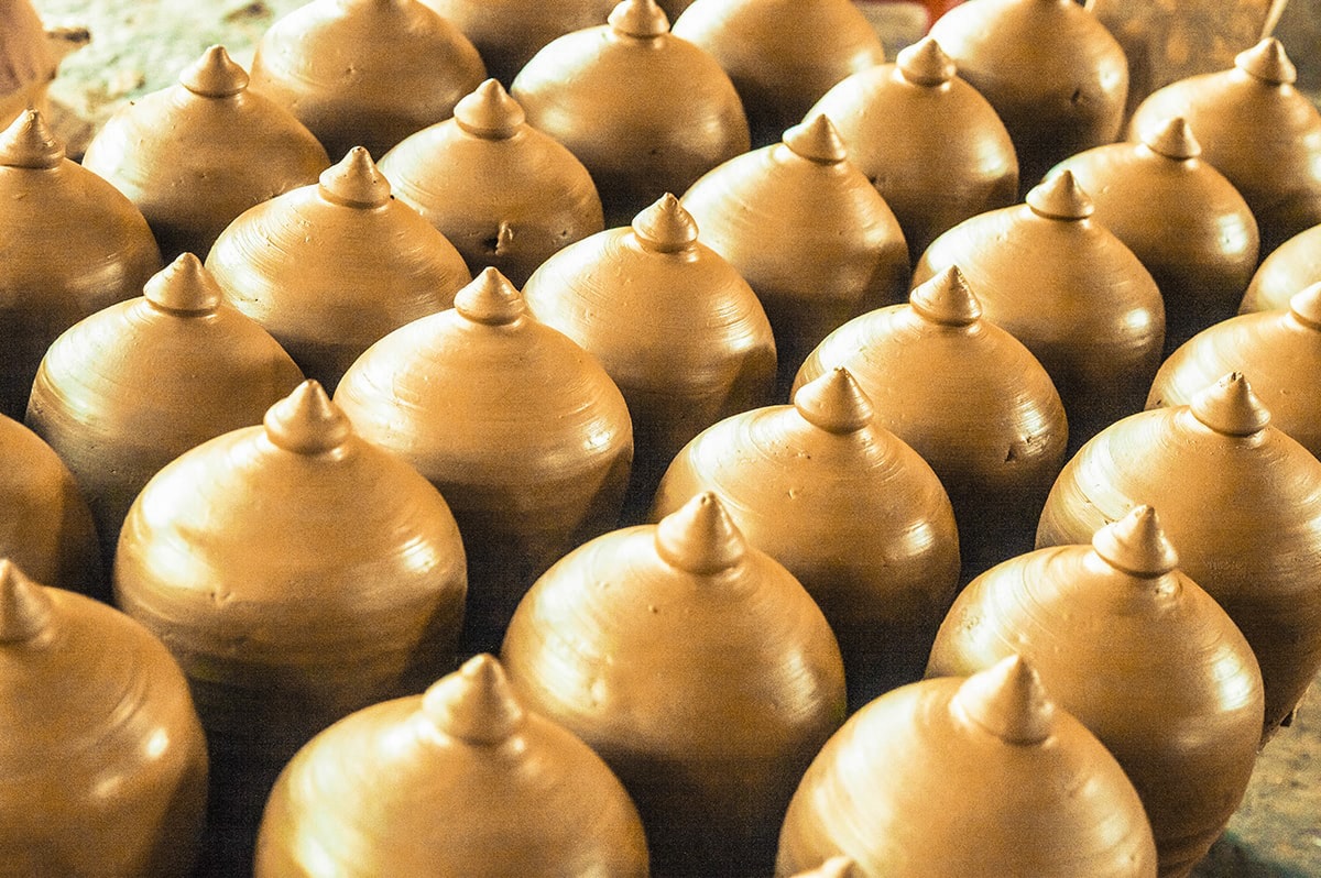 symmetrical pots drying in sun