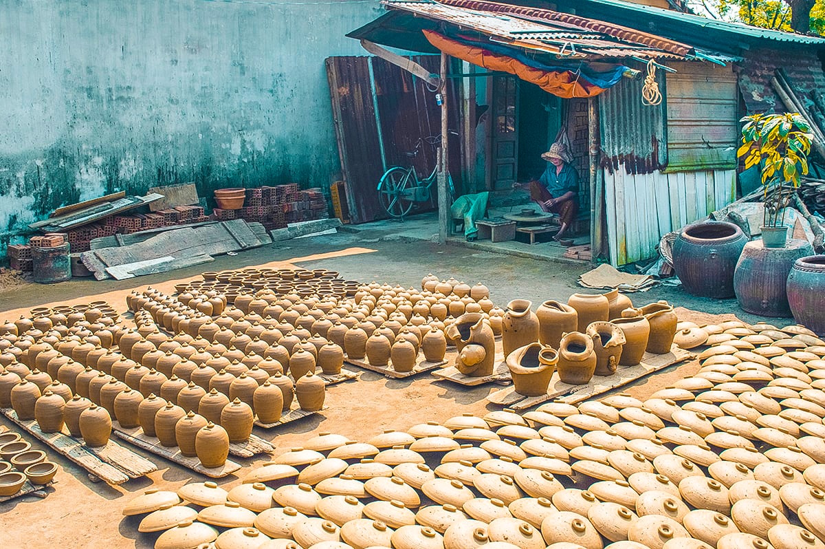 drying pots outside a house at thanh ha pottery village in hoi an