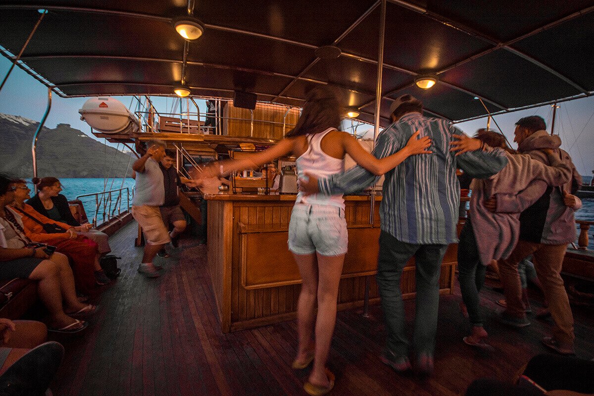 Volcano Tour In Santorini: What To Expect 18 dancing on sailboat volcano tour santorini