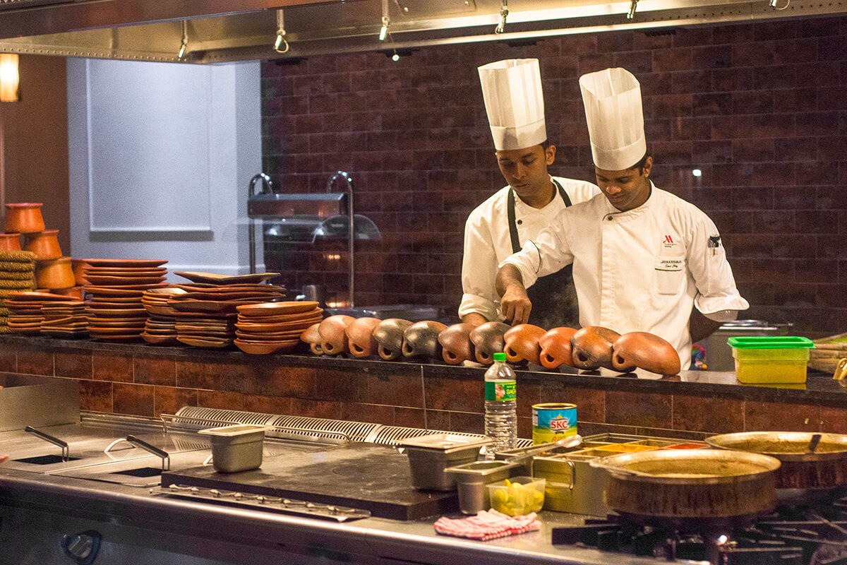 chefs cooking at the kochi marriott hotel