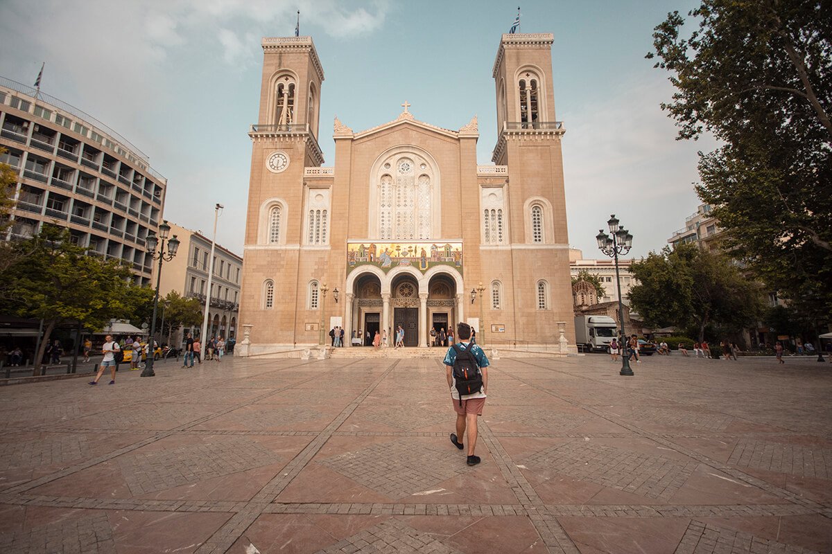 james walking towards church in athens