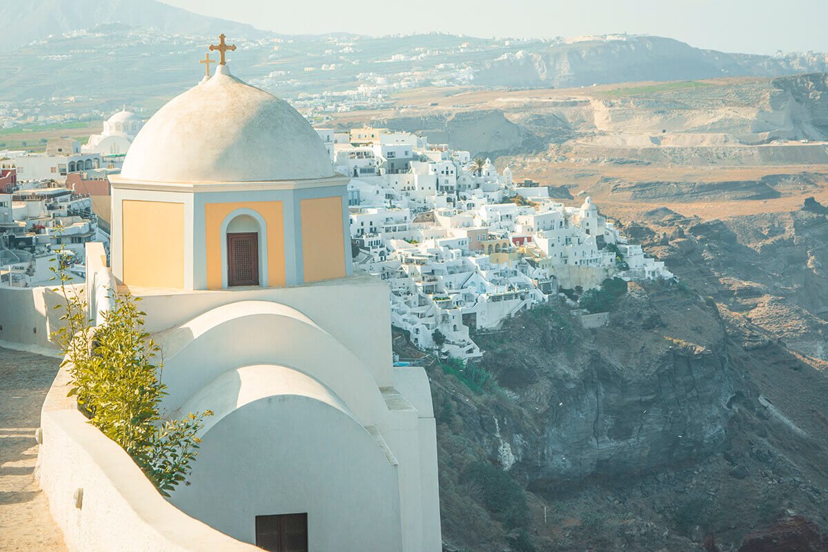 yellow church in santorini views