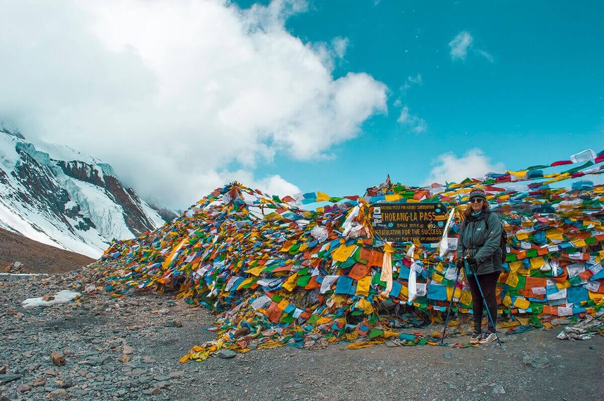 prayer flags and tasha amy high camp to muktinath over thorong la pass on the annapurna circuit