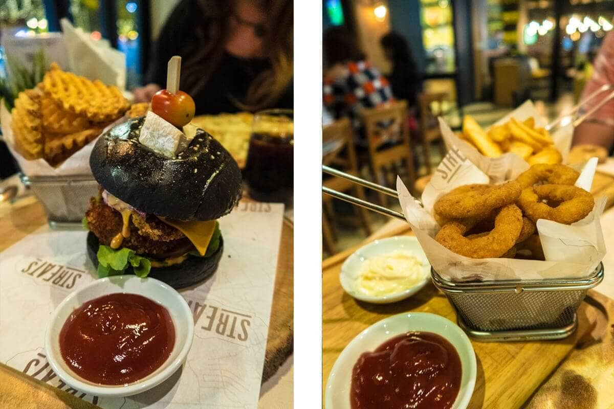 charcoal chicken burger and onion rings at streat restaurant