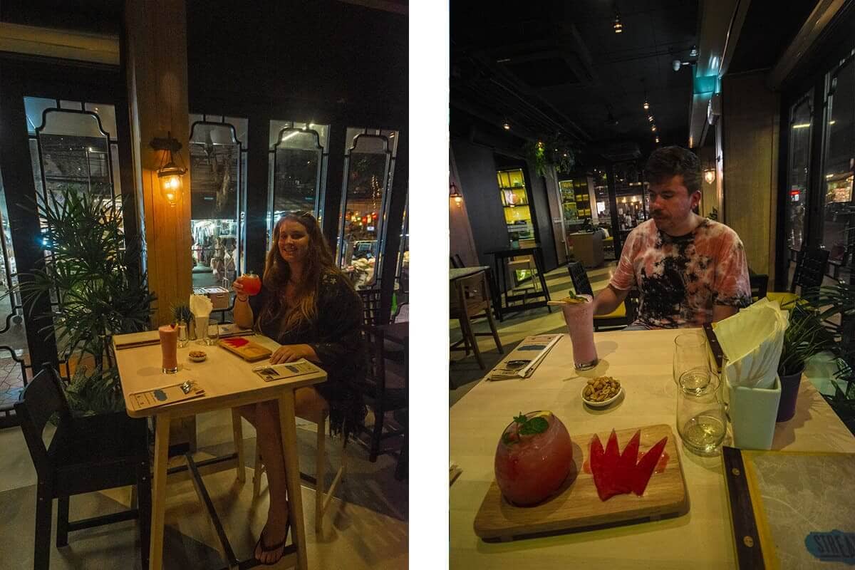 enjoying a cocktail at the streats restaurant and cafe