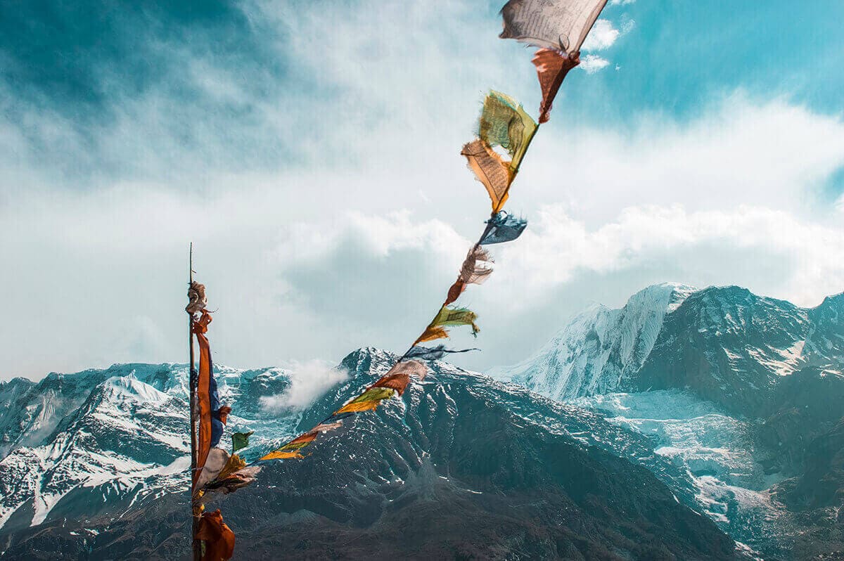 prayer flags manang rest day on the annapurna circuit in nepal