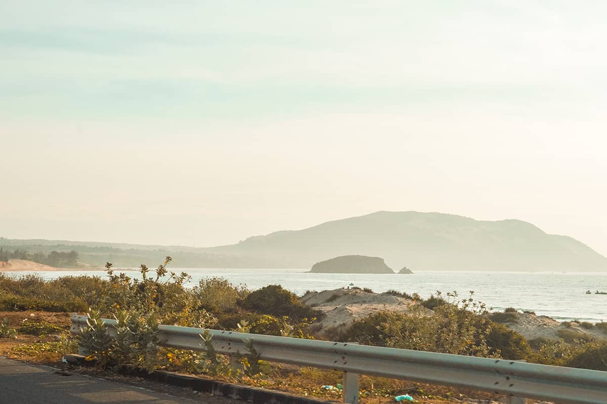 Nha Trang To Mui Ne: Travel By Bus, Train Or Private Transfer 9 looking out from the road over the coast in mui ne