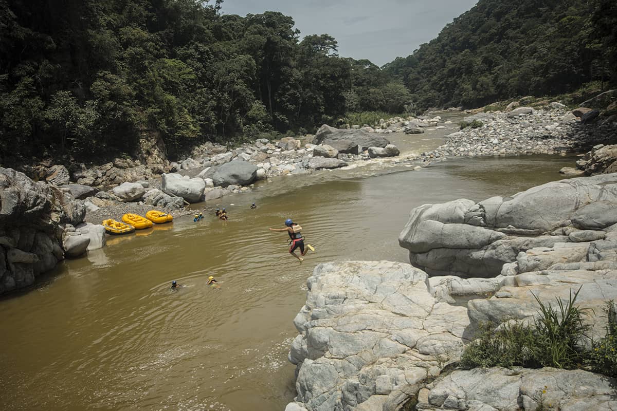 jumping off some of the big boulders along the river in pico bonito national park