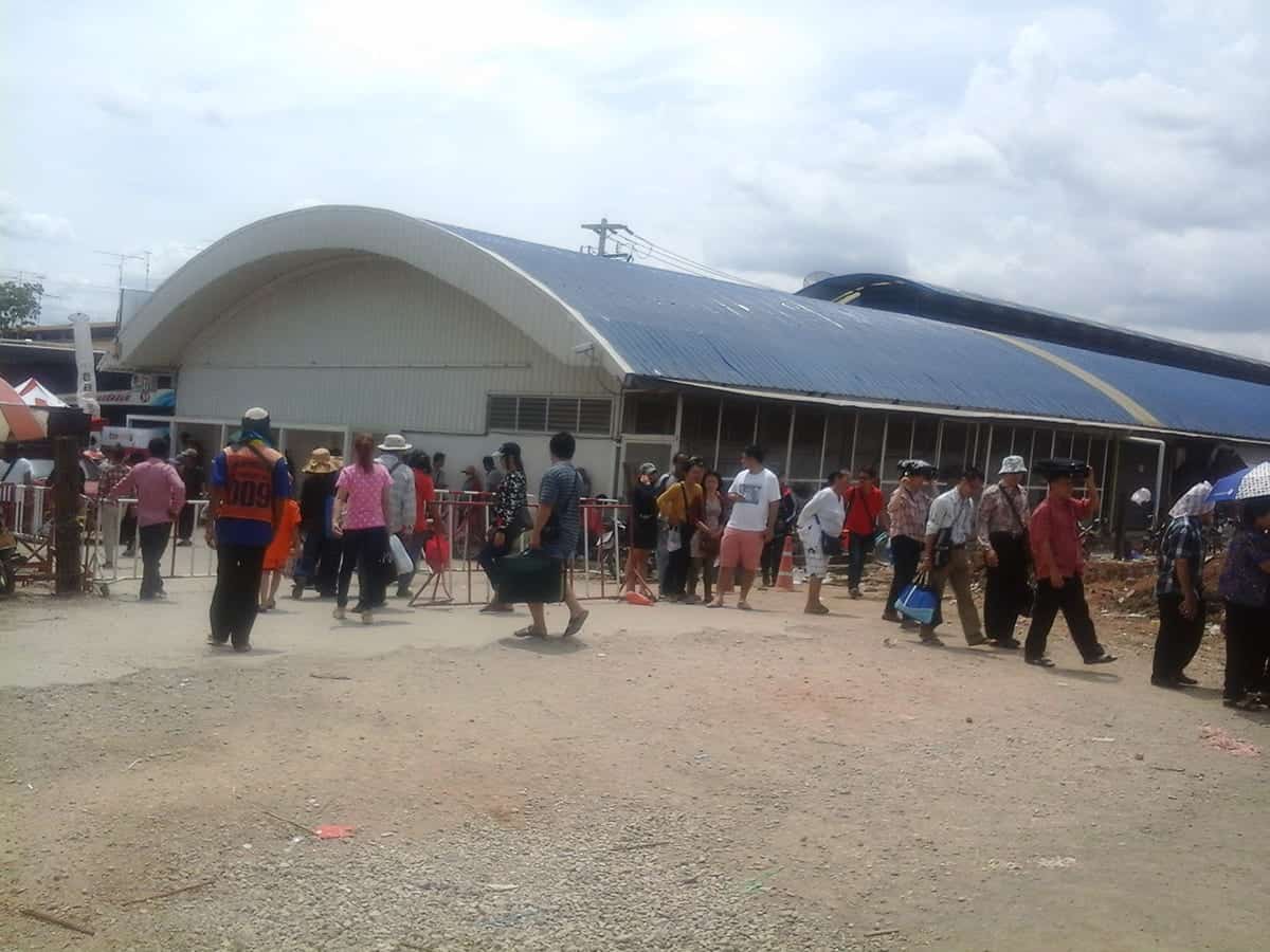 Siem Reap To Bangkok: The 4 BEST Ways To Travel 4 waiting on the thailand side of the border crossing after being let into the country