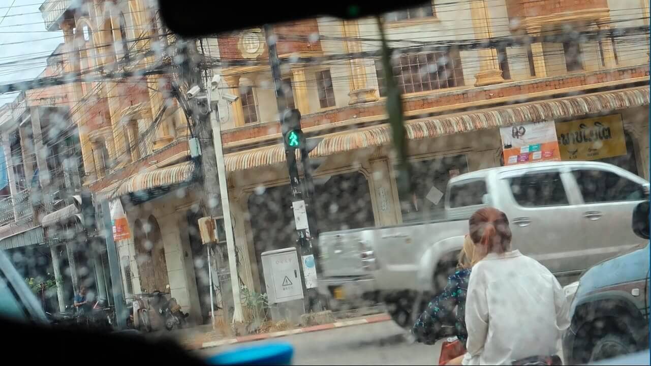 traffic in rain at pakse laos