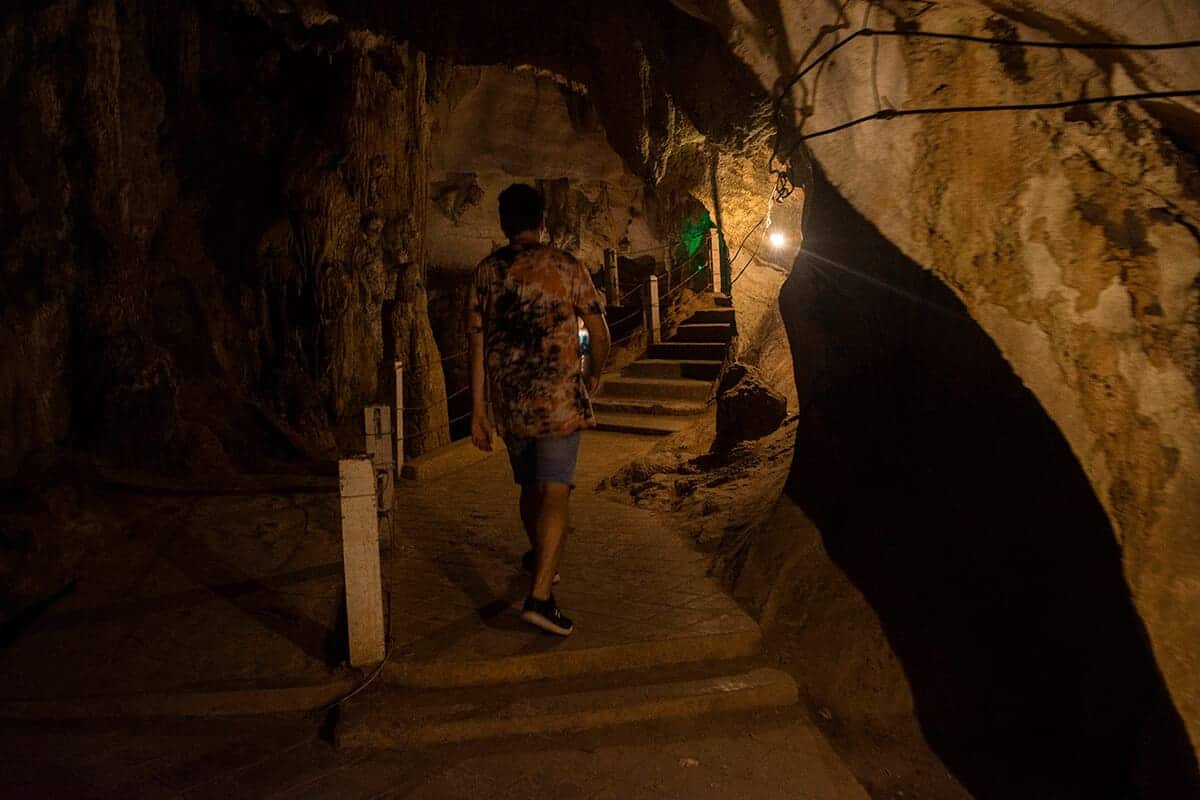 james walking inside tham chang cave
