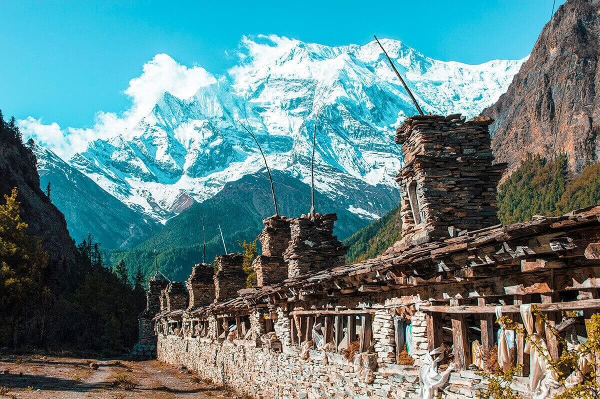 prayer wheel and mountain upper pisang to ngawal on the annapurna circuit nepal