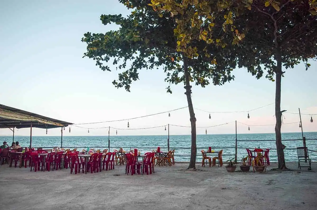 a seaside restaurant during sunset in mui ne