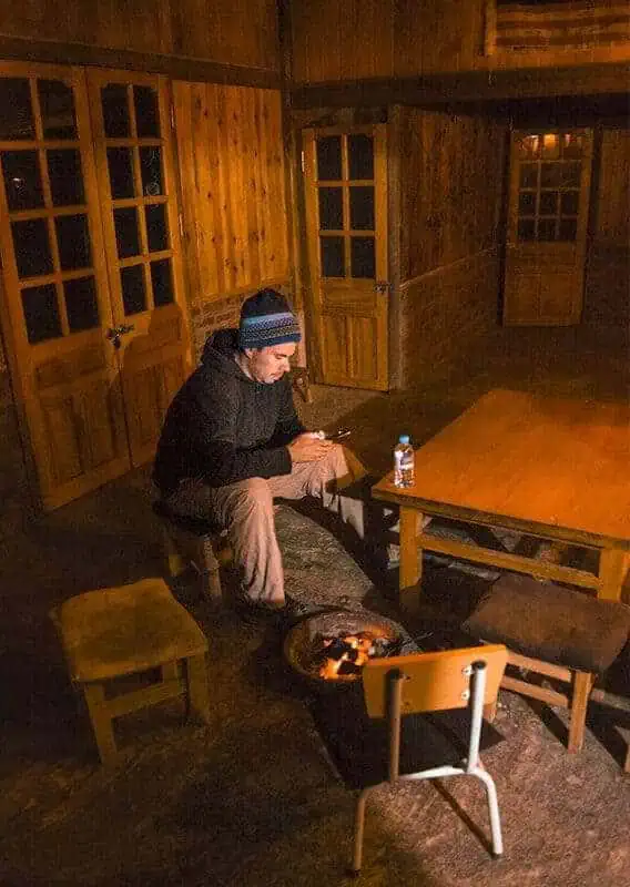 sitting around the fire with no heating at our homestay in sapa