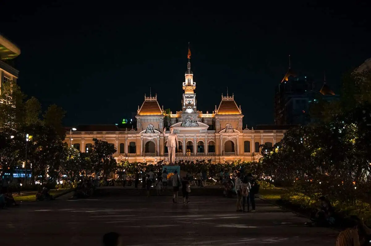 Saigon Central Post Office lit up at night, a stunning architectural highlight for a Vietnam itinerary.