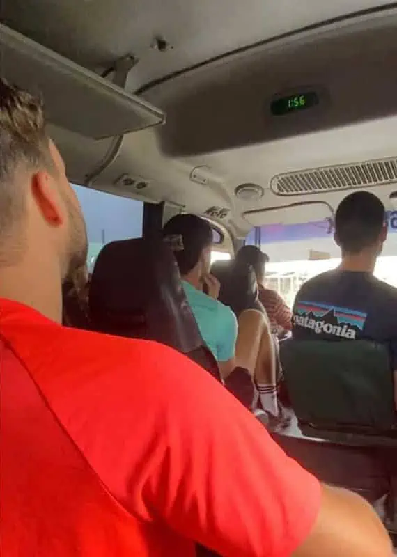 jumping on the bus to the trailhead of the hike