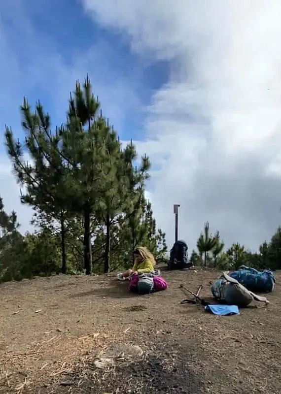 having a quick rest and a breather on the acatenango volcano hike difficulty