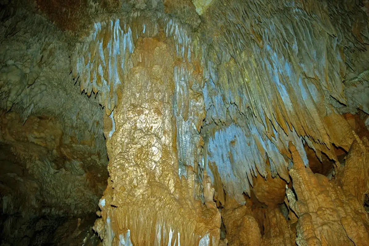 stalactites growing from the ceiling of the atm cave