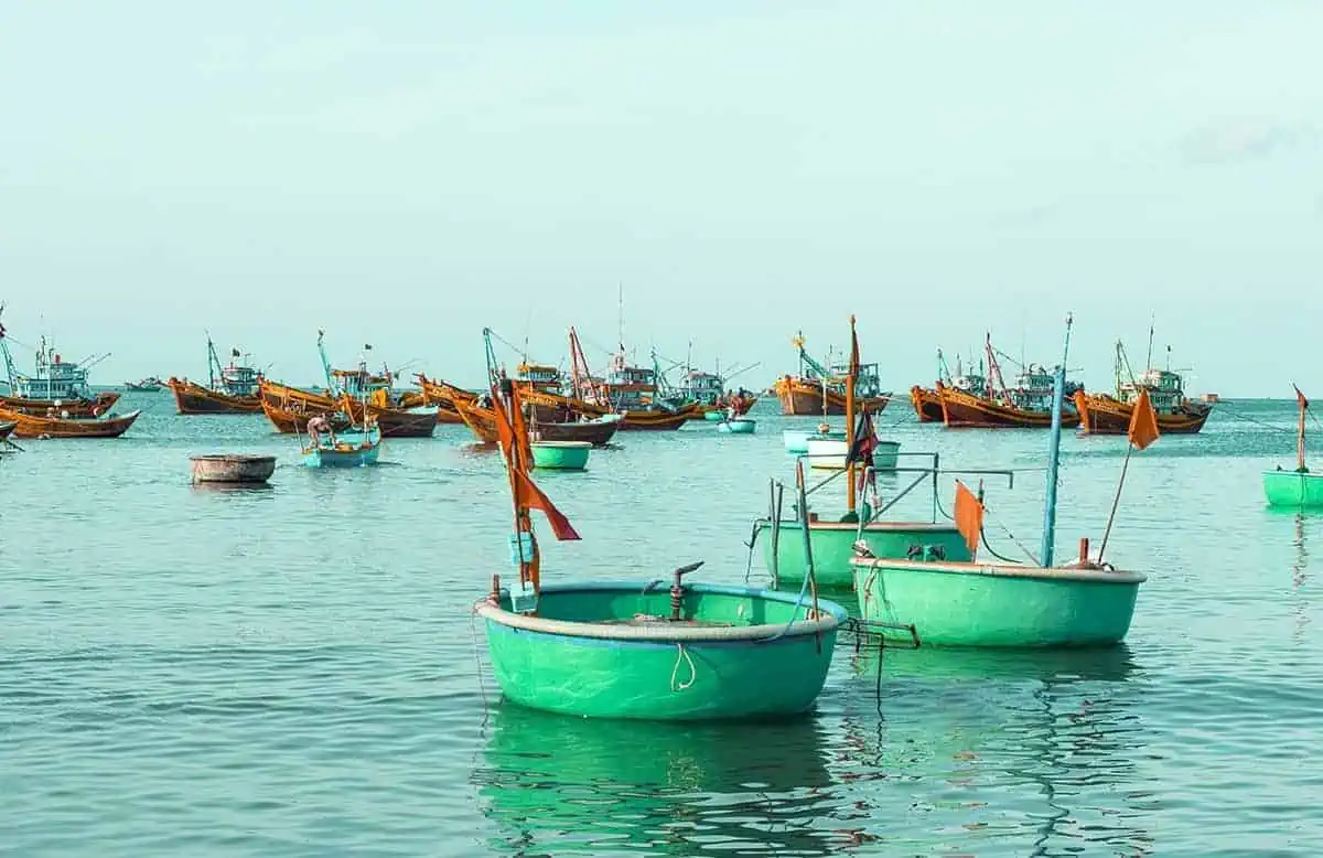 local style fishing boats at sea in the fishing village in mui ne