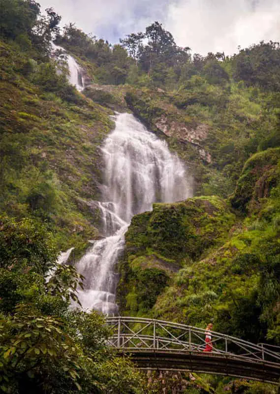 looking up at love waterfall across the bridge