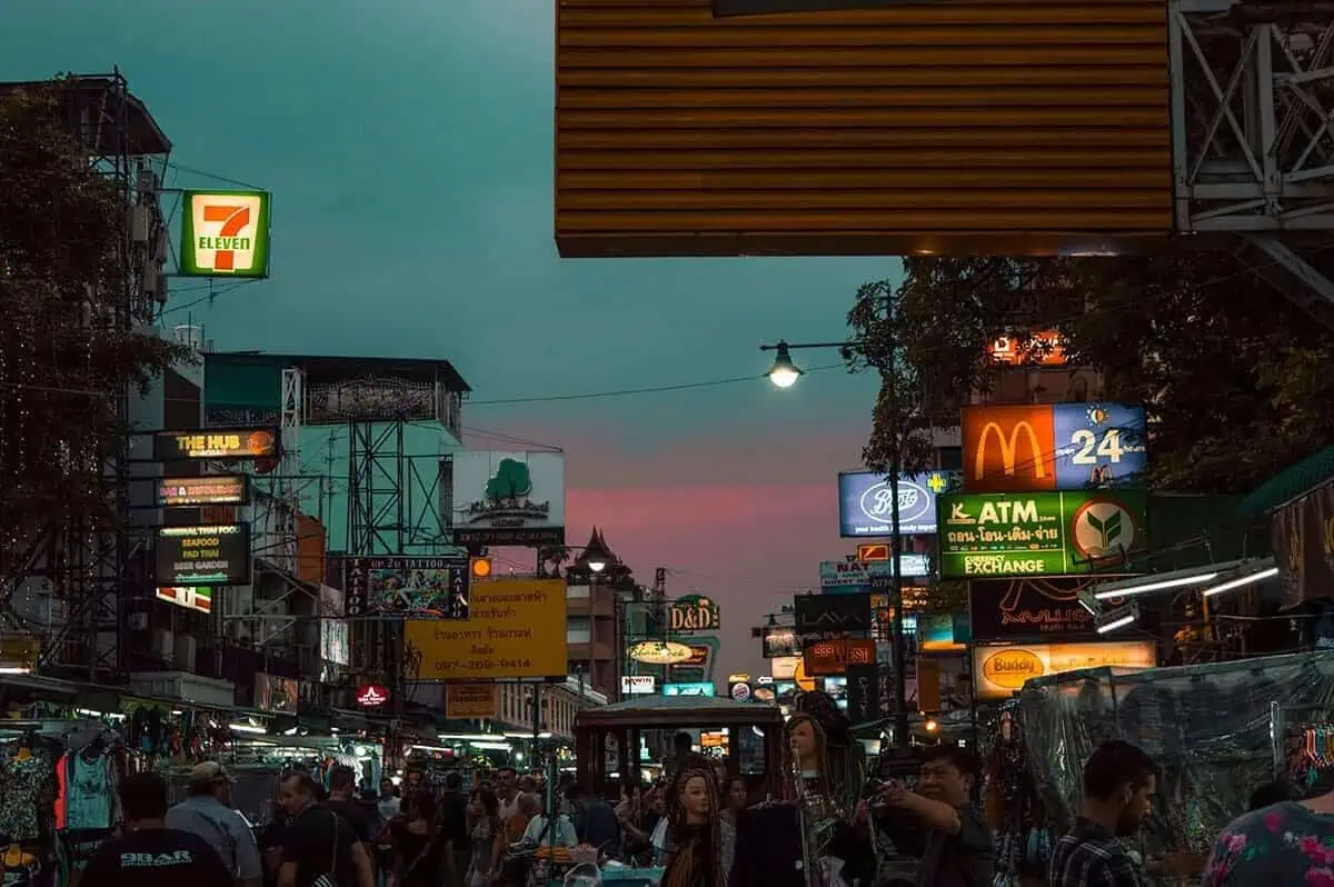 partying on khao san road in bangkok during sunset