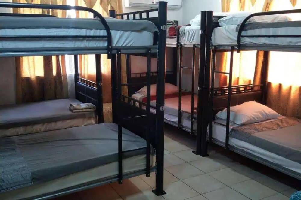 plenty of beds in the mixed dorm room at the red hut hostel in belize city