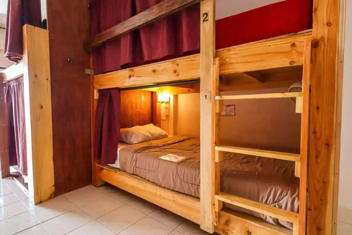 wooden style on theme bunks at the cabin backpackers hostel in chiang mai