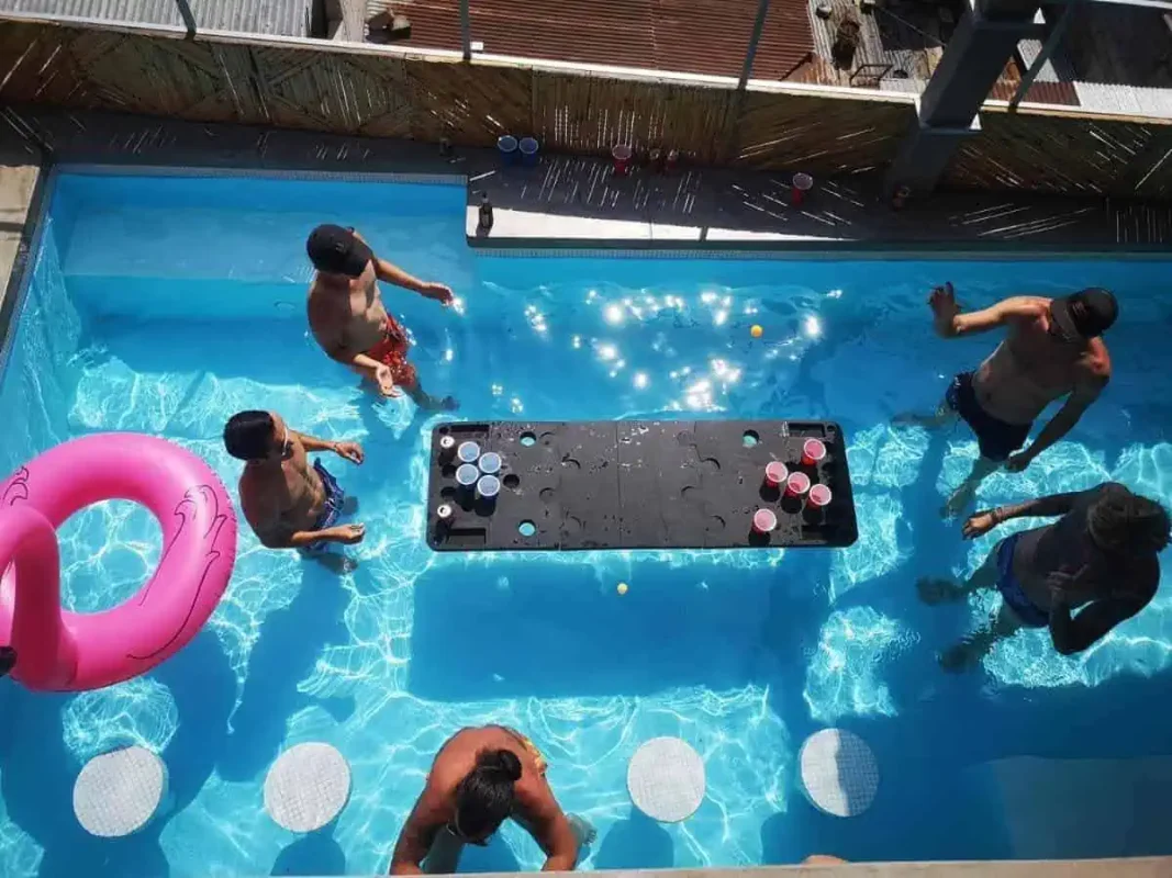 beer pong in the pool at the social dreamboat hostel in panajachel