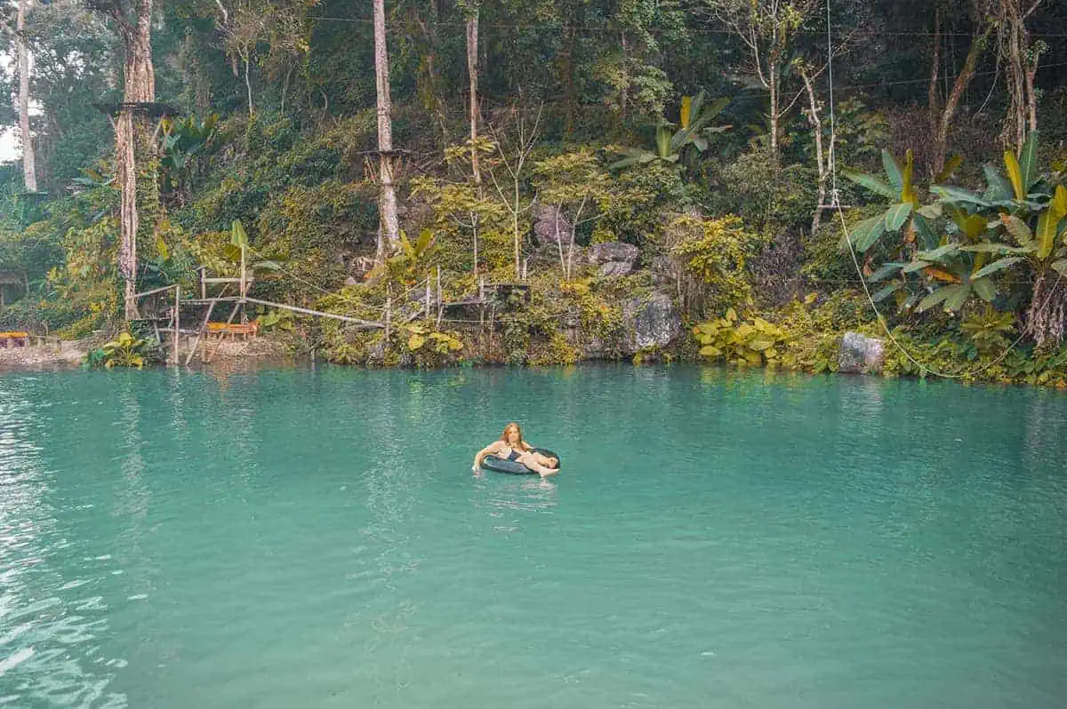 swimming on a tube at blue lagoon 3 in vang vieng