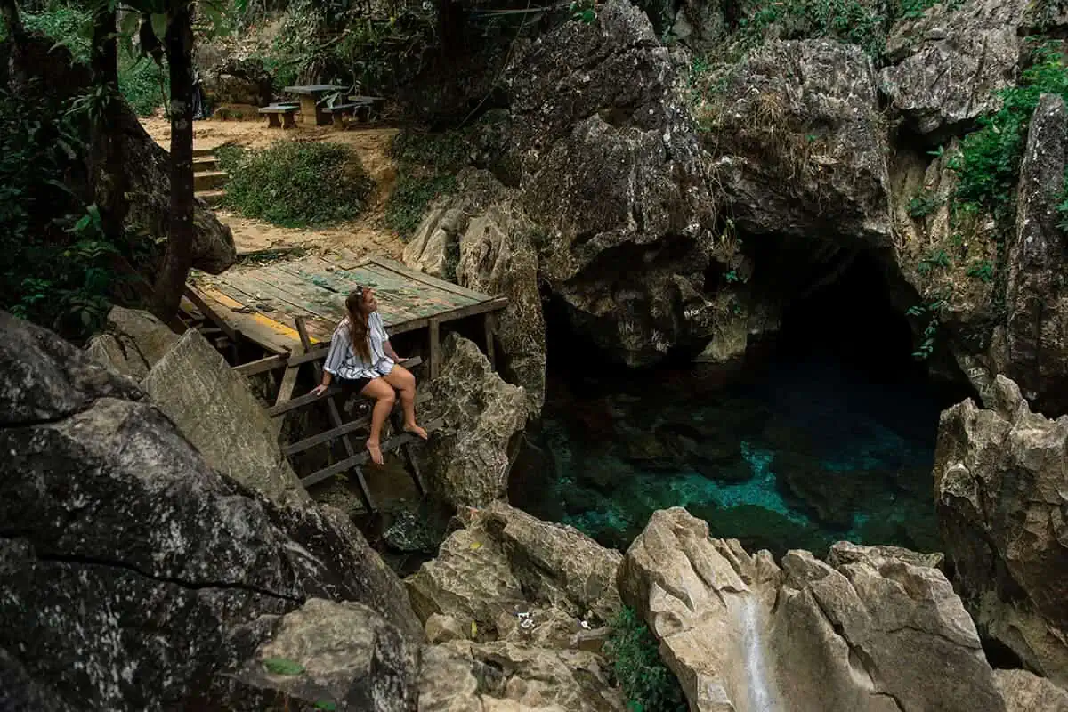 tasha amy sitting at blue lagoon two in vang vieng